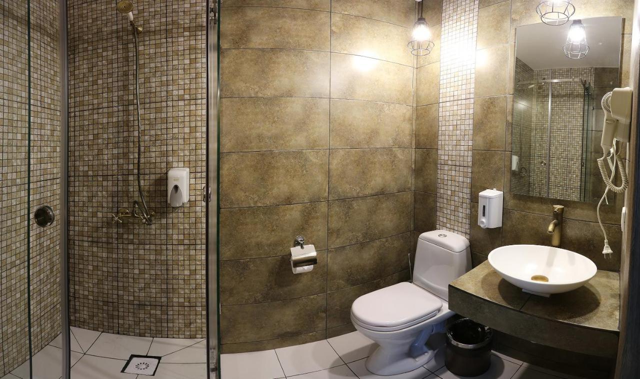 אלמטי Astra Hotel מראה חיצוני תמונה
